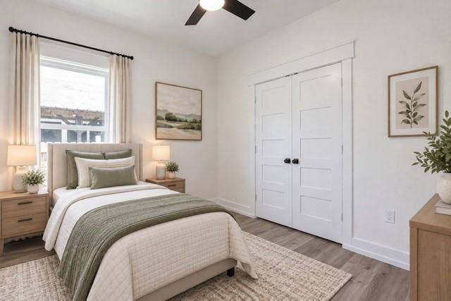 2608 Cleveland Avenue, Waco, TX 76711 Virtual staging - Wood-finish flooring, white paneled closet doors, single window with trim, and a ceiling fan with light fixture