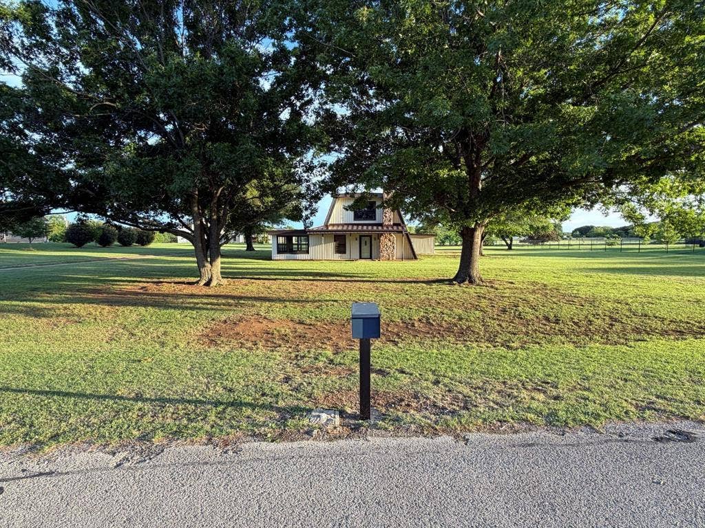 221 Timberview Court, Argyle, TX 76226 view from road towards hous