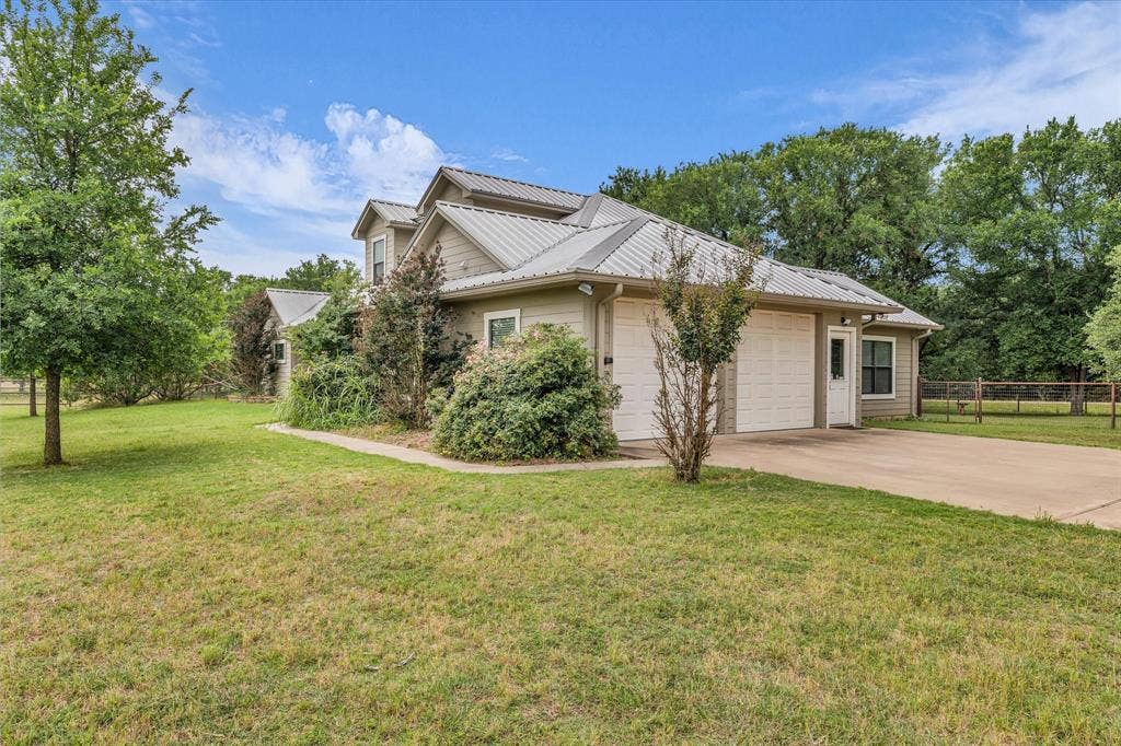 613 Bone Road, Valley Mills, TX 76689 Exterior with light-toned siding and a metal roof