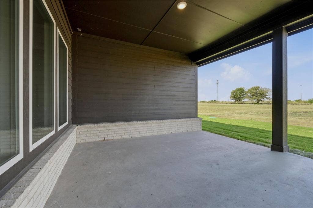 2305 Quartz Street, Krum, TX 76249 Covered patio with concrete flooring, recessed lighting, and a dark-toned siding exterior