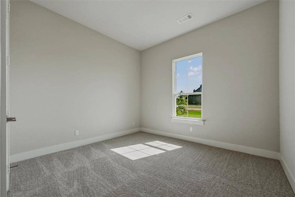 2305 Quartz Street, Krum, TX 76249 Neutral wall paint, single window, gray carpet flooring, white trim
