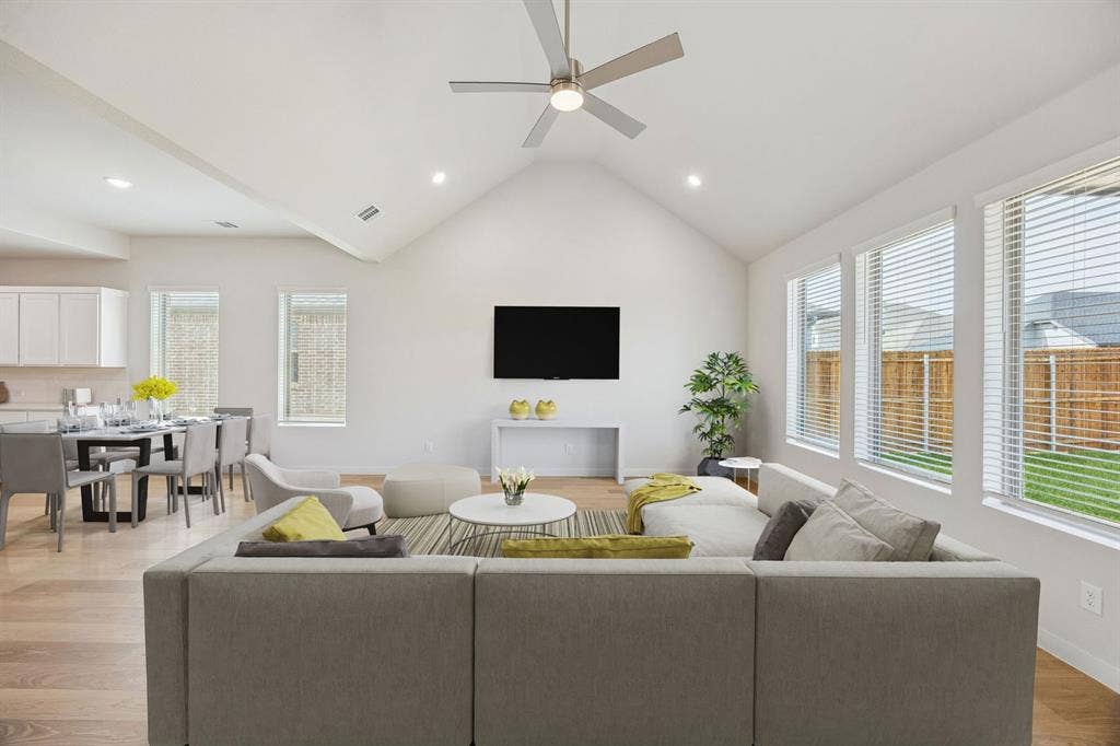 492 Hocking Hills Drive, Waxahachie, TX 75165 Living and Dining Room in the Stanley II home plan by Trophy Signature Homes – REPRESENTATIVE PHO