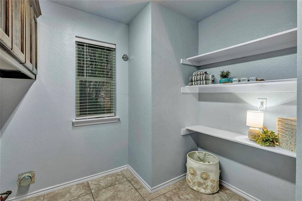 2405 Charlene Drive, Plano, TX 75074 room for washe and dryer, as well as plenthy of other storage