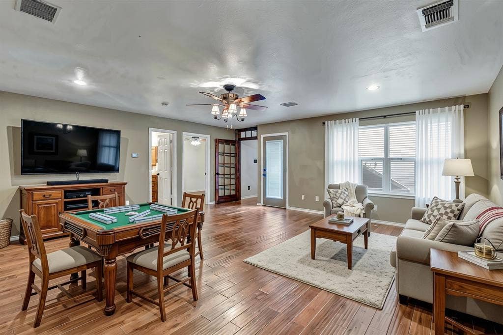 2405 Charlene Drive, Plano, TX 75074 Upstairs game room Staged with ai to show you what a great space this is upstairs