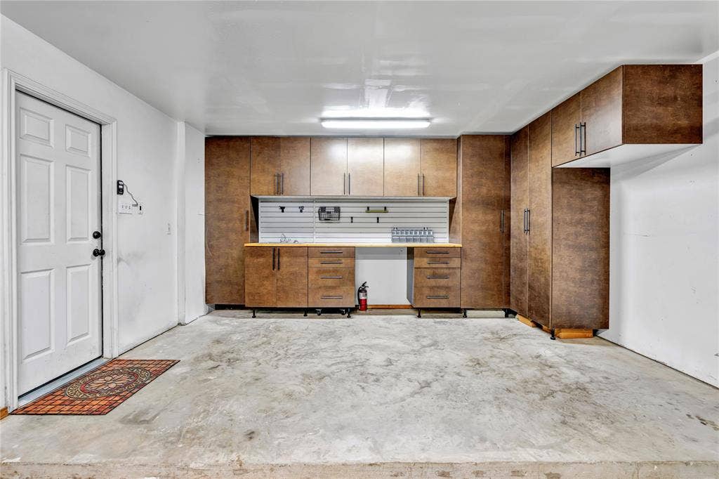 2405 Charlene Drive, Plano, TX 75074 This shop is built into the garage and is conveniently located close to the kitchen