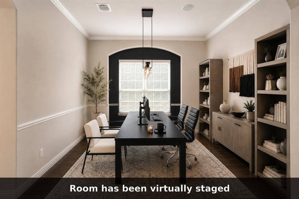 Dining room virtually staged as an office to demonstrate its flexible use.