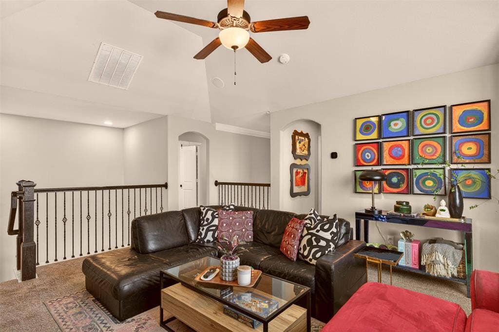 Generously sized game room offers space for multiple seating and activity areas.