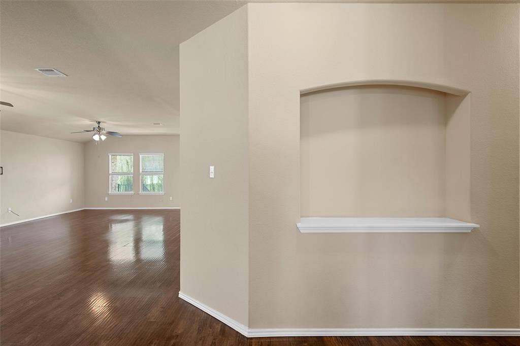 Recessed wall niche with a white display shelf