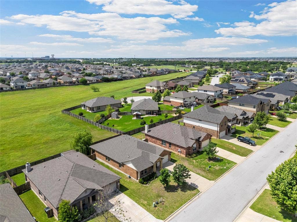 Aerial perspective showcasing a residential development with varied architectural styles