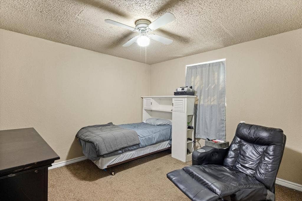 405 Granbury Court, Granbury, TX 76049 First bedroom on main level.