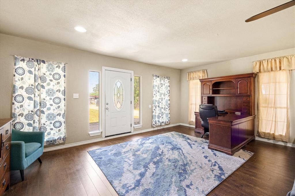 405 Granbury Court, Granbury, TX 76049 Large living area that can used for multiple spaces.
