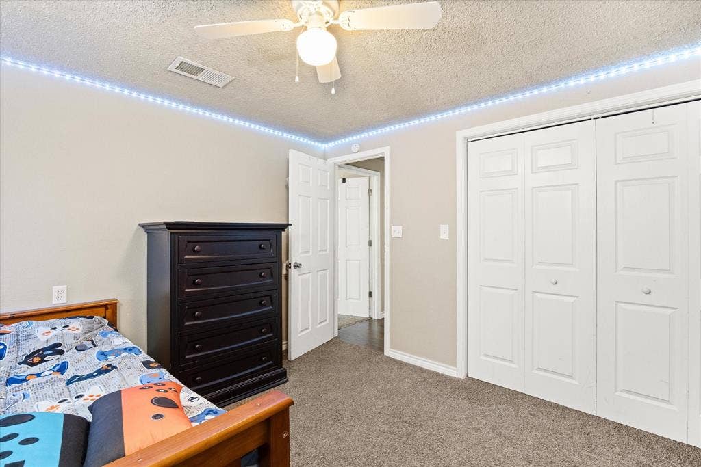 405 Granbury Court, Granbury, TX 76049 Secondary bedroom.
