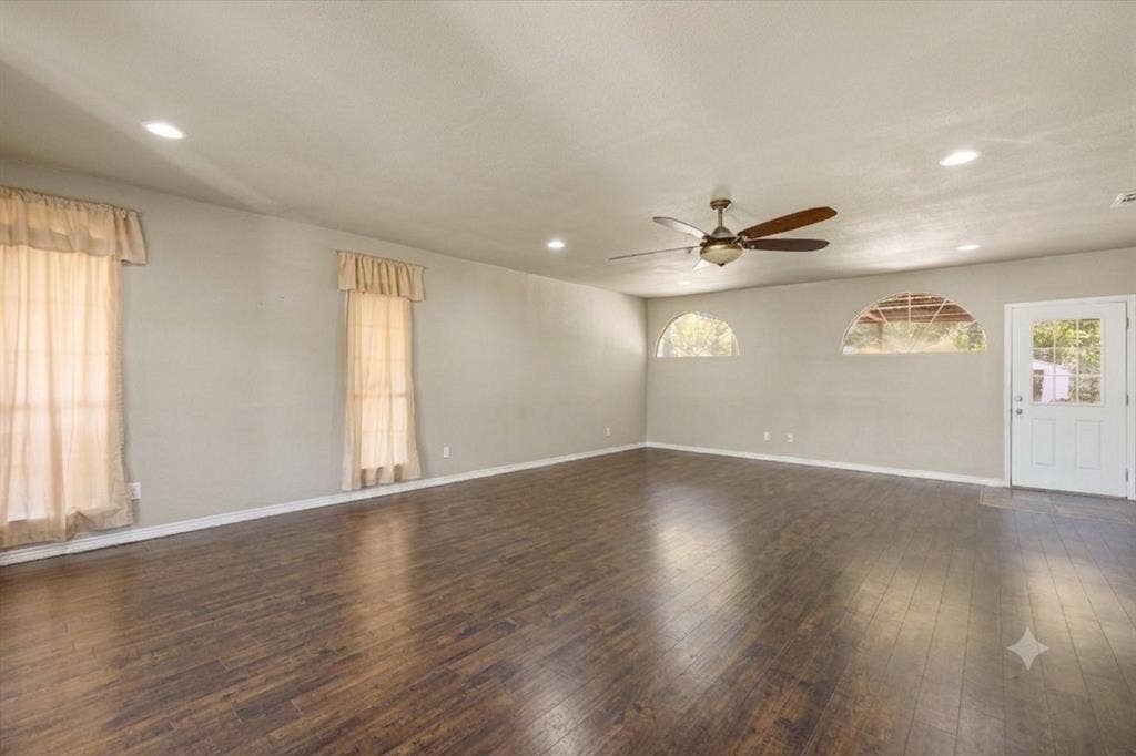 405 Granbury Court, Granbury, TX 76049 Photo digitally edited using AI to remove furniture/personal items. Property shown in as-is condition
