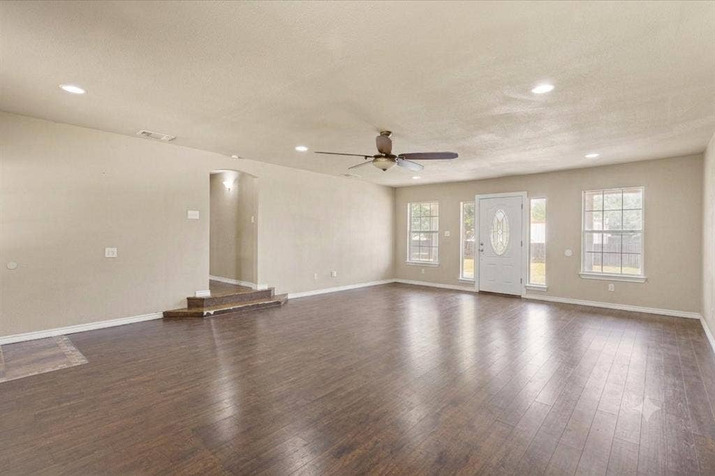405 Granbury Court, Granbury, TX 76049 Photo digitally edited using AI to remove furniture/personal items. Property shown in as-is condition