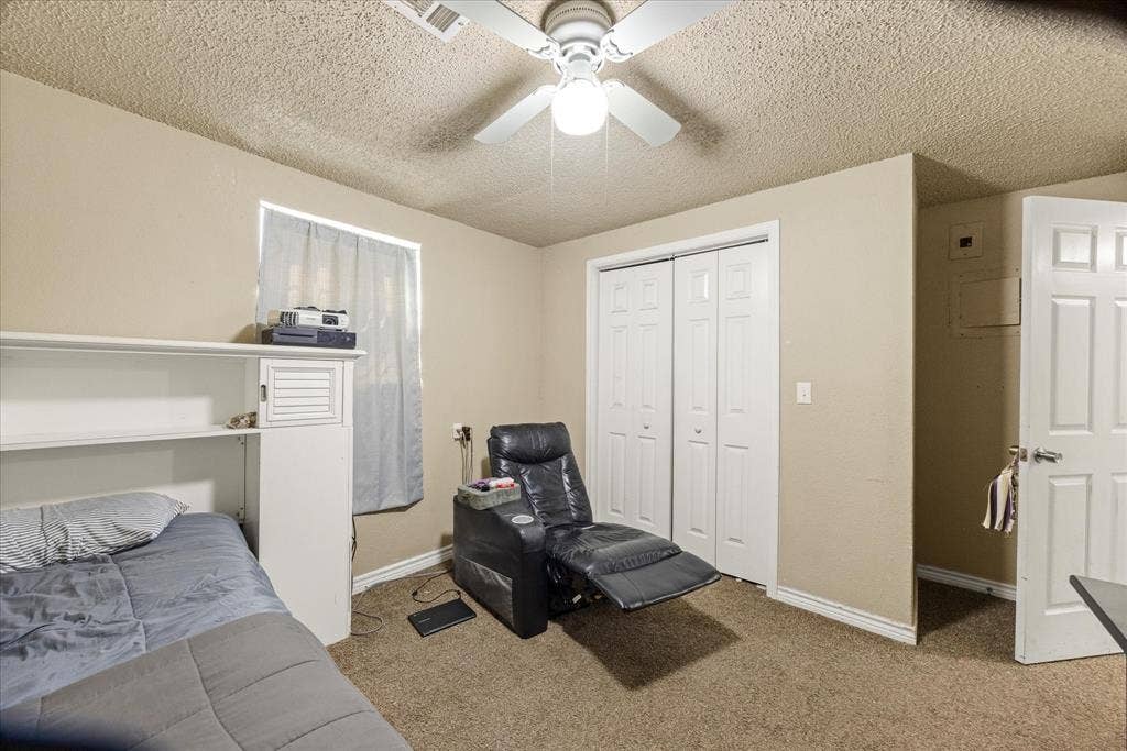 405 Granbury Court, Granbury, TX 76049 Main level bedroom.