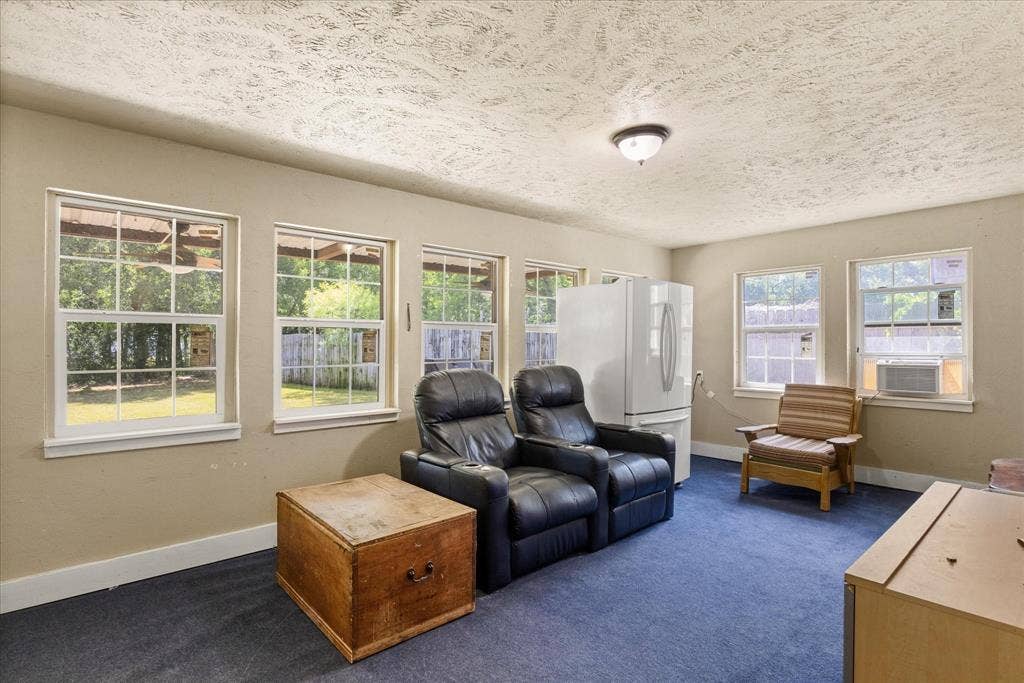 405 Granbury Court, Granbury, TX 76049 Sunroom, media room, play room, office, the possibilities are up to you!