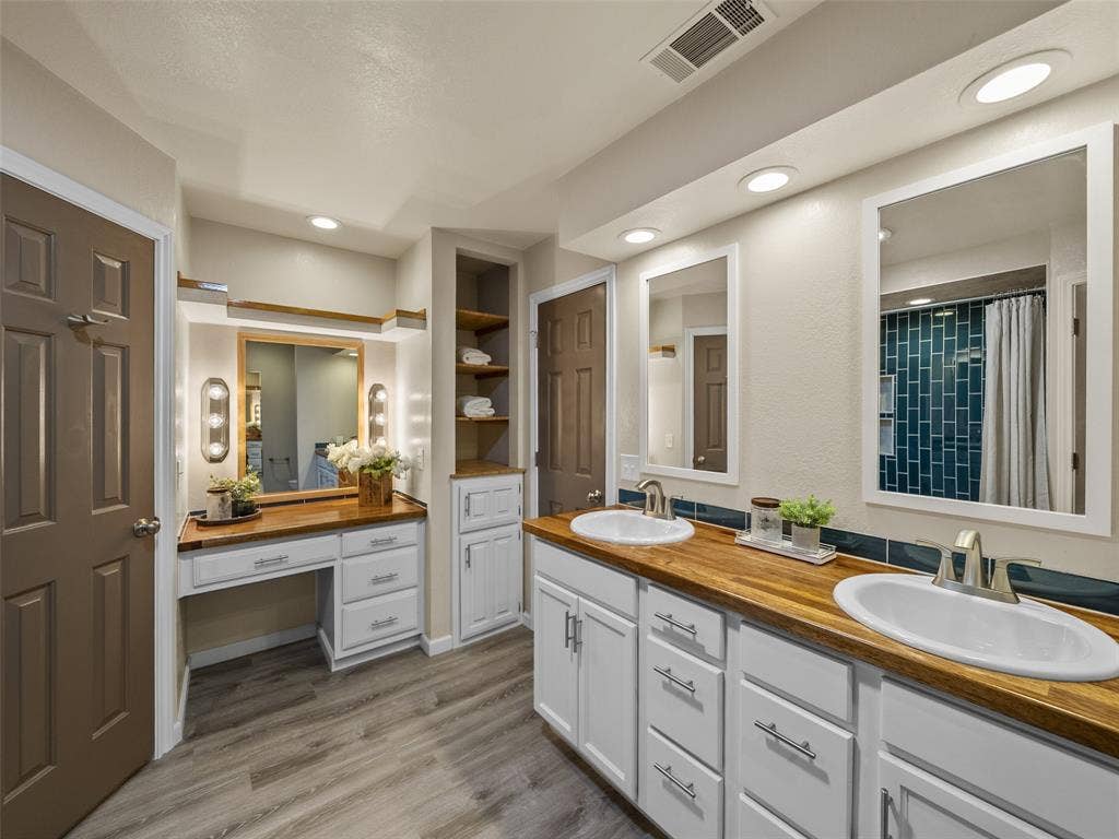 4100 Emerson Drive, Plano, TX 75093 Master bath features a vanity space, and dual sinks.