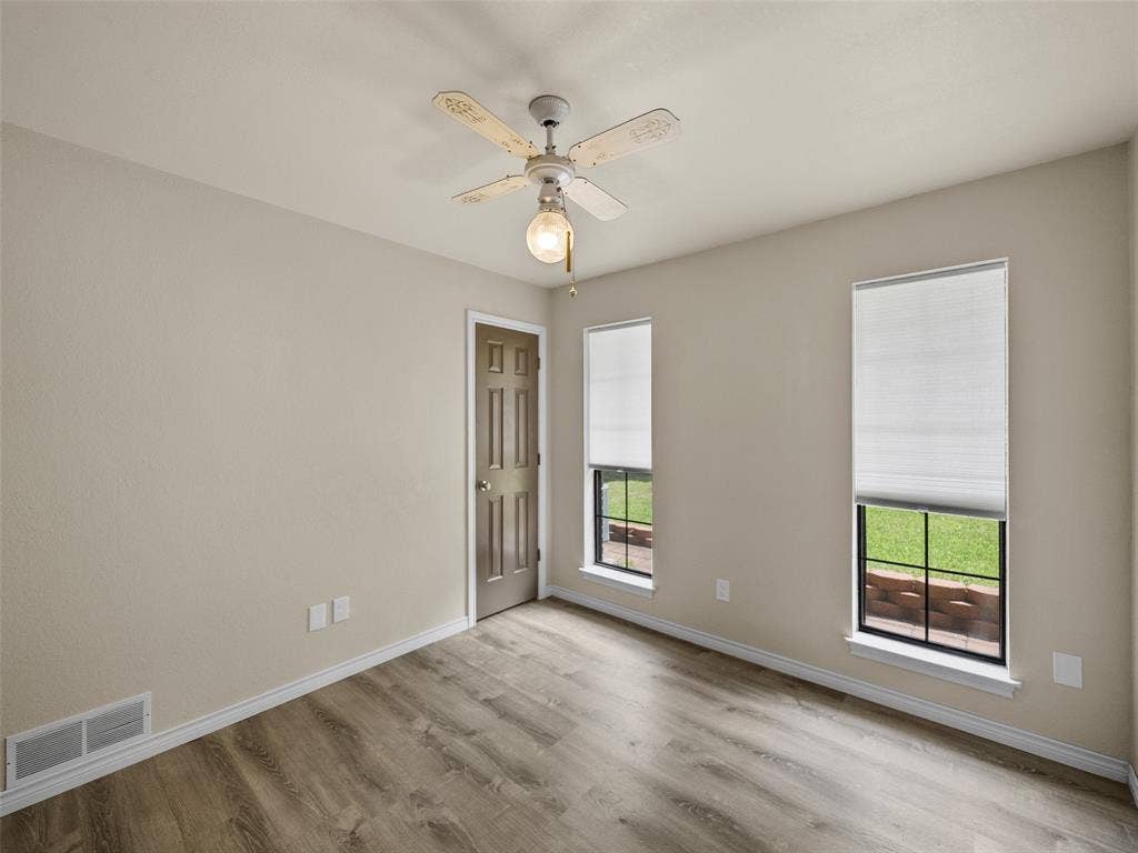 4100 Emerson Drive, Plano, TX 75093 Secondary bedroom has extra accessories in closet.