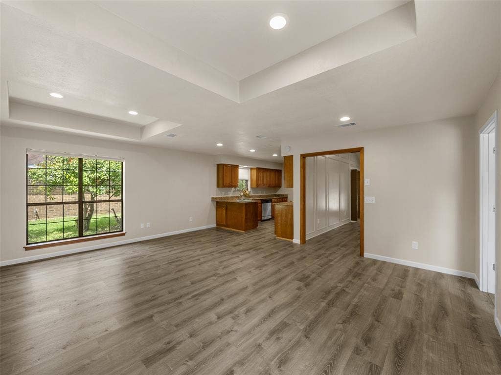 4100 Emerson Drive, Plano, TX 75093 The game room and the breakfast nook area each feature box ceiling affects and are open to each other.