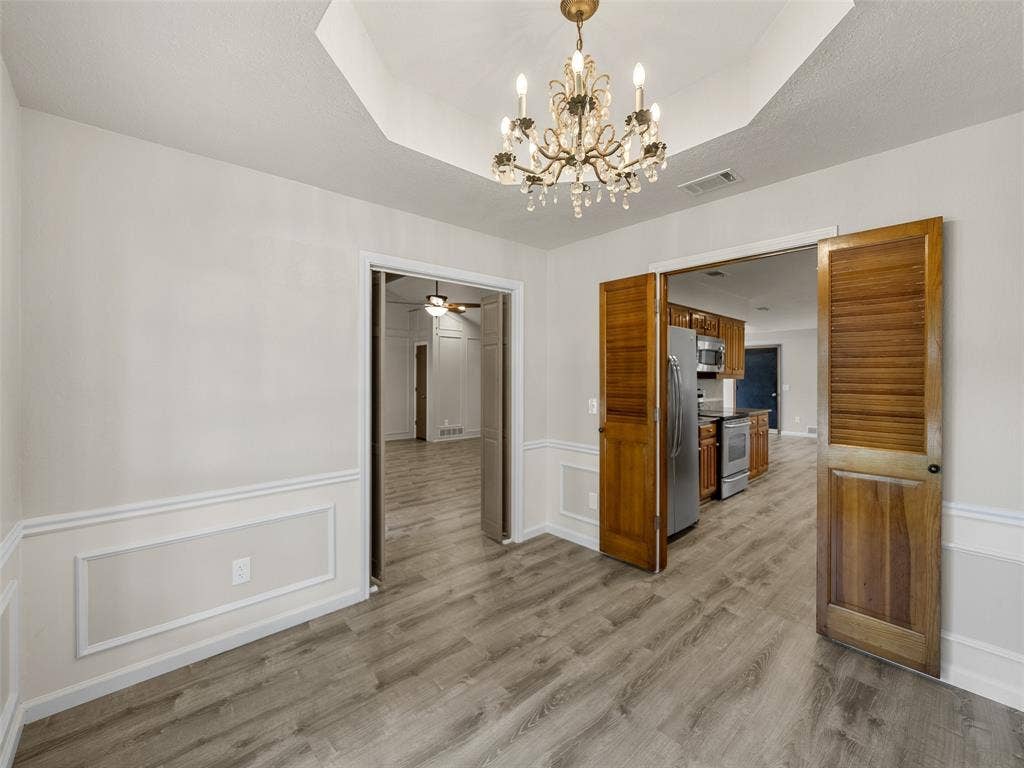 4100 Emerson Drive, Plano, TX 75093 This room has double doors entering both the living room and kitchen so it can be completely closed off.
