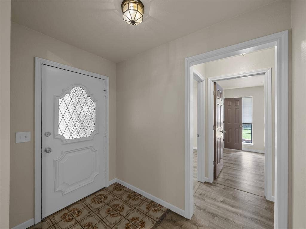 4100 Emerson Drive, Plano, TX 75093 Off the entry with it's original charm of character in the front door and tile is a large walk-in closet.