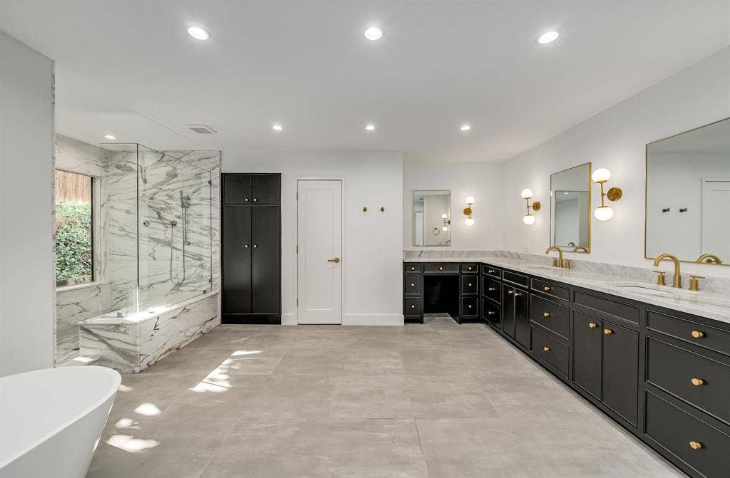 6275 Preston Creek Drive, Dallas, TX 75240 Bathroom featuring a soaking tub, a marble finish shower, double vanity, and recessed lighting