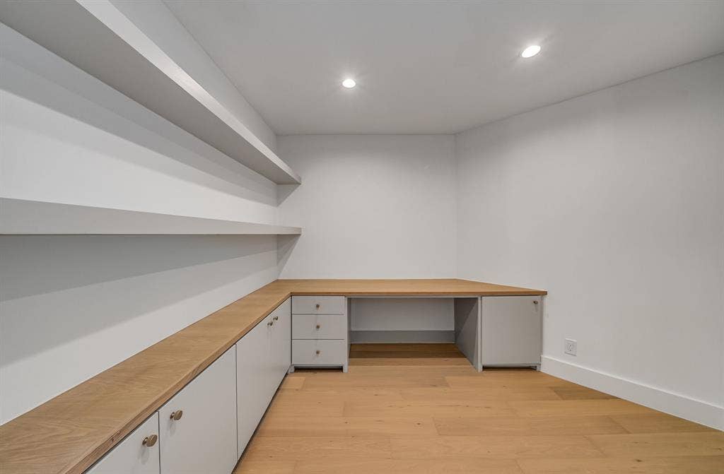 6275 Preston Creek Drive, Dallas, TX 75240 Unfurnished office with built in desk, recessed lighting, and light wood-type flooring