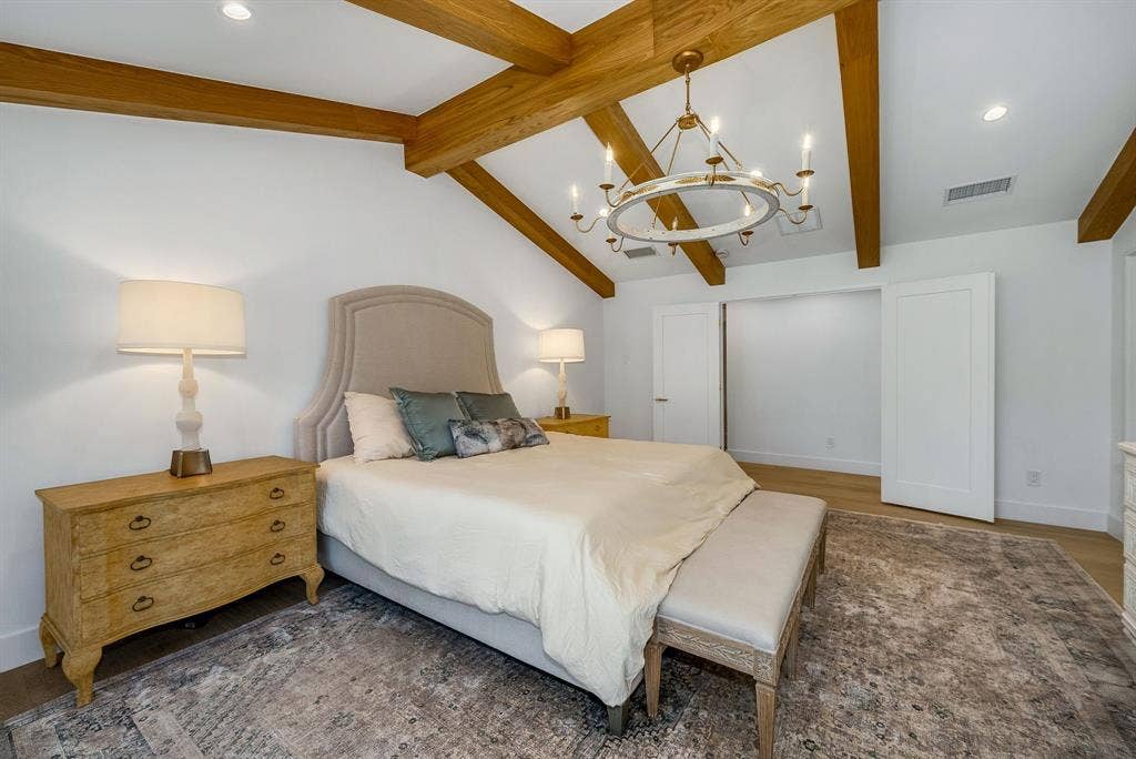 6275 Preston Creek Drive, Dallas, TX 75240 Bedroom with a chandelier, recessed lighting, and light wood-style flooring