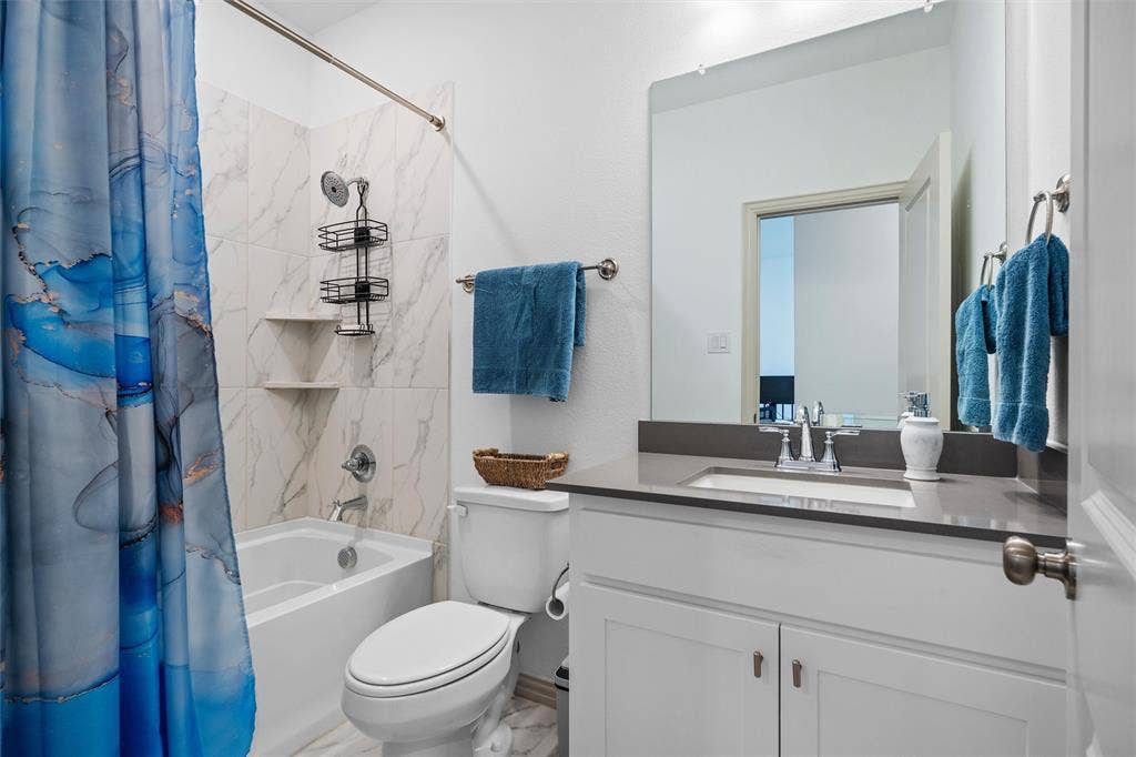 Space for full sized washer and dryer.