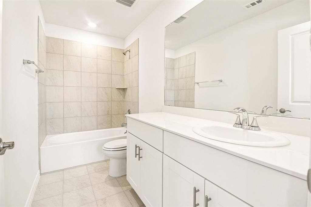 3033 Texoma Boulevard, Farmersville, TX 75442 Photo is not of the actual home, but is an inspirational photo of builder’s model home and may depict options, furnishings, and/or decorator features that are not included.