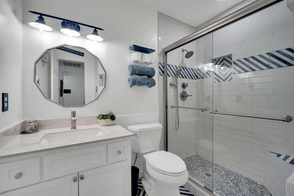 4431 Kings Court, Midlothian, TX 76065 Custom tile and granite in guest bath.