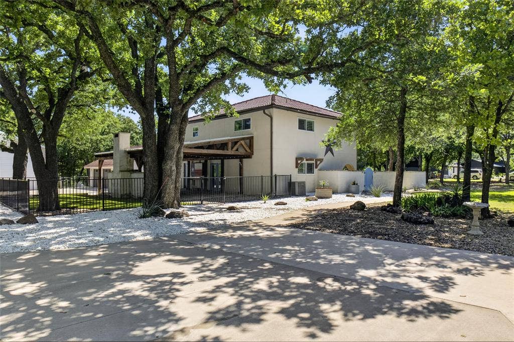 690 Orchid Hill Lane, Copper Canyon, TX 76226 As you drive up there's a parking pad right at the entry.