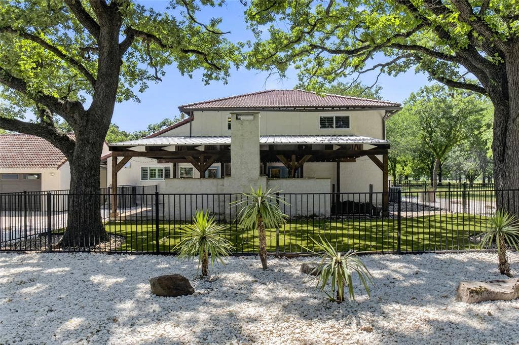 690 Orchid Hill Lane, Copper Canyon, TX 76226 Beautiful setting of gated back courtyard with turf dog run