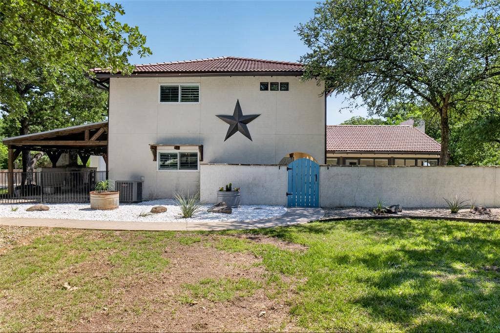 690 Orchid Hill Lane, Copper Canyon, TX 76226 Sidewalk to the entry leads you to a gate that opens into the front courtyard