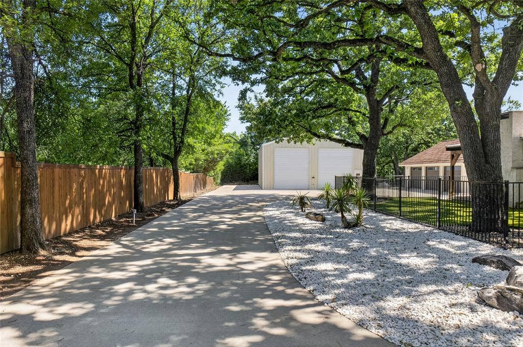 690 Orchid Hill Lane, Copper Canyon, TX 76226 Driveway to garage and huge workshop