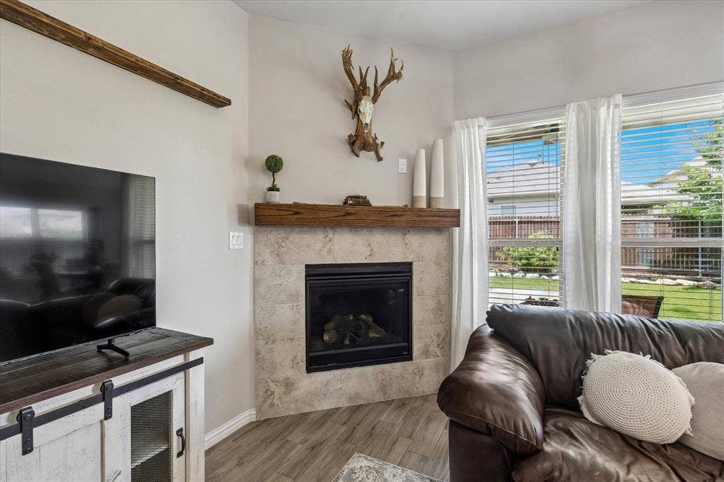 14824 Rocky Face Lane, Fort Worth, TX 76052 Open Living area with a cozy gas fireplace. A great place to bundle up on a cold winter night.