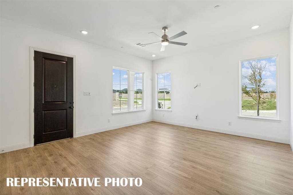 1026 Splitrock Drive, Allen, TX 75013 Our end unit Martin plan offers a multiple walls of windows to flood the home with natural light. REPRESENTATIVE PHOTO