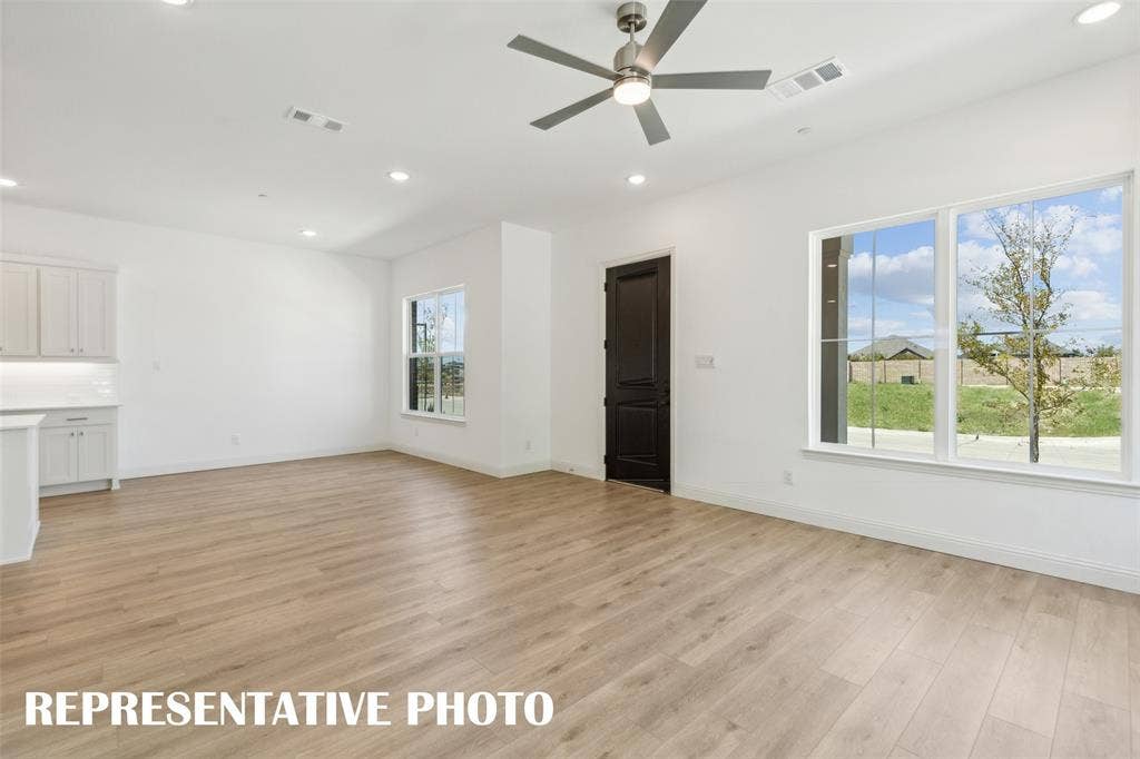 1026 Splitrock Drive, Allen, TX 75013 Welcome into your light and bright family room! REPRESENTATIVE PHOTO