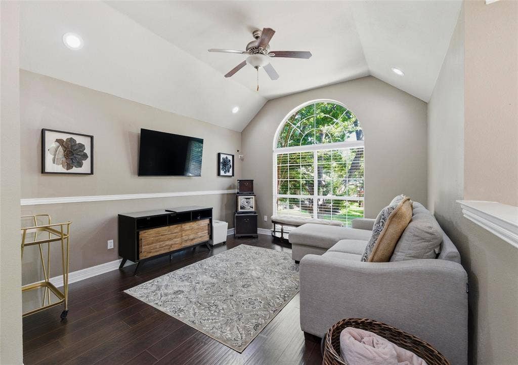 1432 Honey Locust Drive, Plano, TX 75023 Upstairs gameroom has engineered wood floors, lots of light, and ceiling fan.