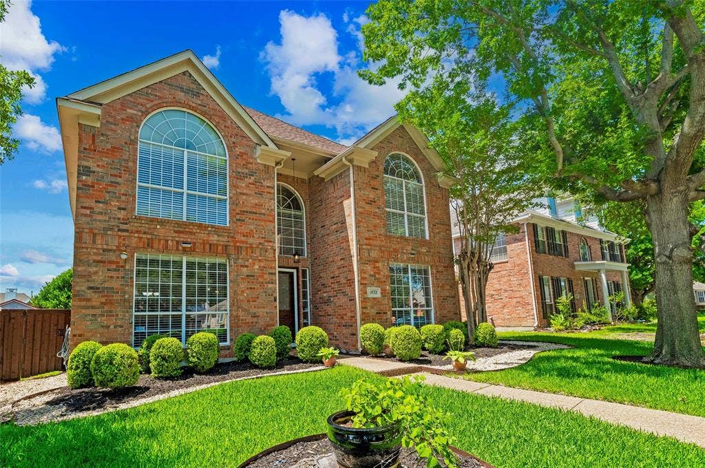 1432 Honey Locust Drive, Plano, TX 75023 Stately drive up with mature landscaping.
