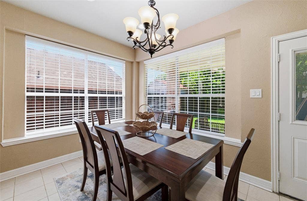 1432 Honey Locust Drive, Plano, TX 75023 Breakfast area with patio door to covered patio