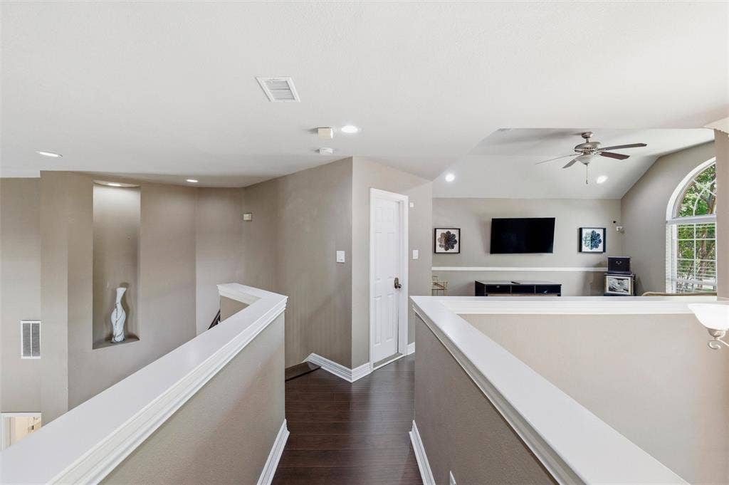 1432 Honey Locust Drive, Plano, TX 75023 Hallway from upstairs BdRms to GameRm. Stairs to the left