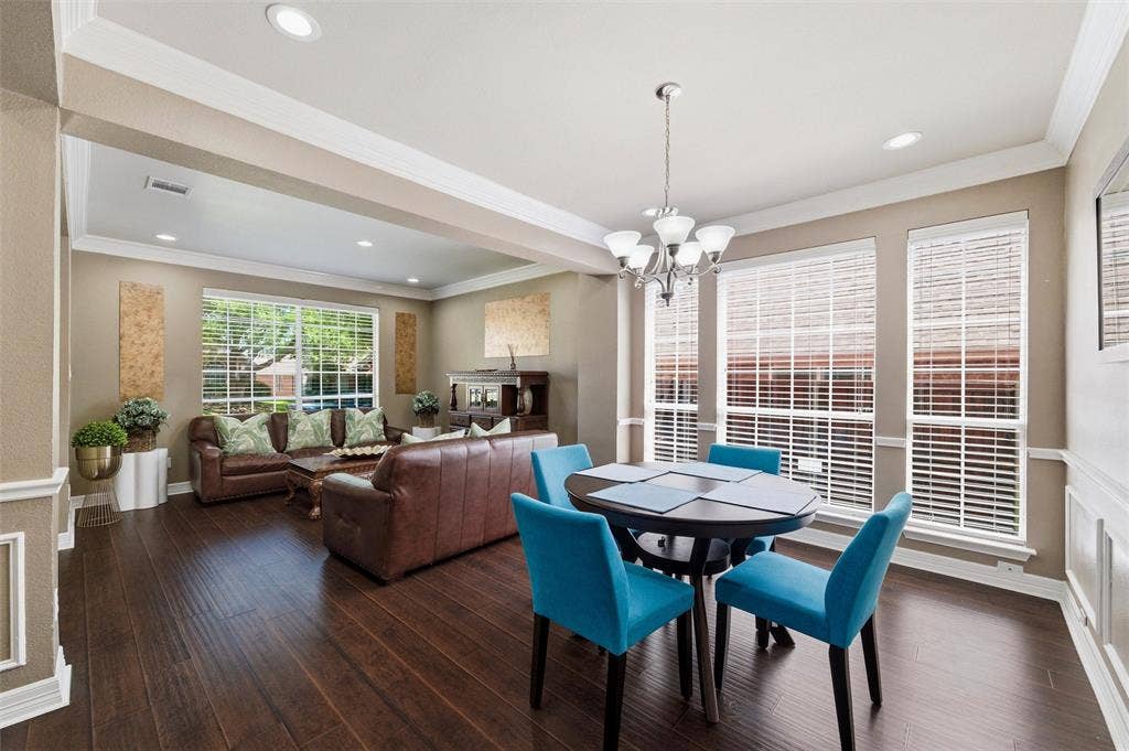 1432 Honey Locust Drive, Plano, TX 75023 Light filled Dining Rm with chair rail and crown molding.