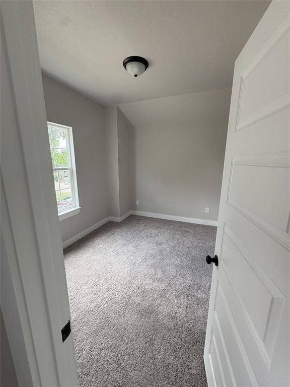 316 Henry Street, Waxahachie, TX 75165 Neutral wall paint, plush grey carpeting, and white trim create a clean aesthetic
