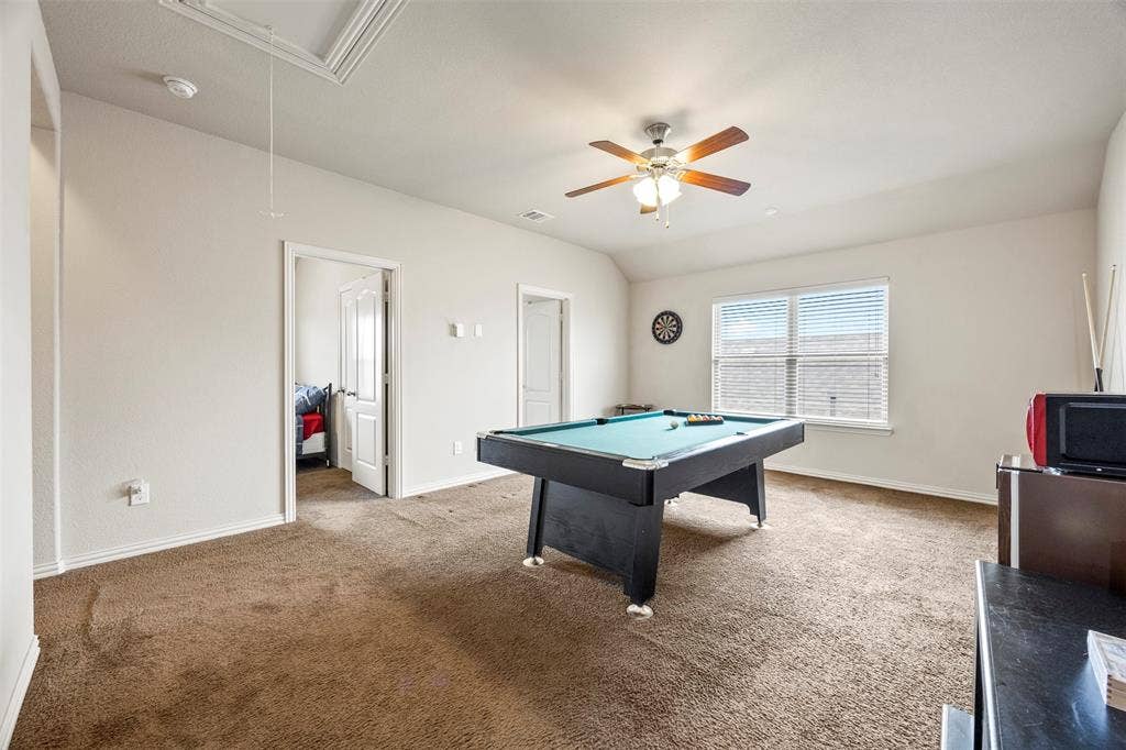 1437 Tanglewood Trail, Northlake, TX 76226 Spacious room with plush brown carpeting, light neutral wall tones, and a window with blinds