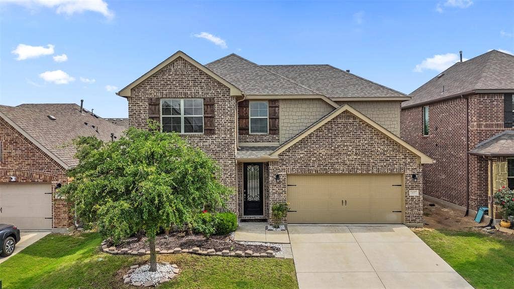 1437 Tanglewood Trail, Northlake, TX 76226 Two-story residence featuring a brick and shake siding exterior