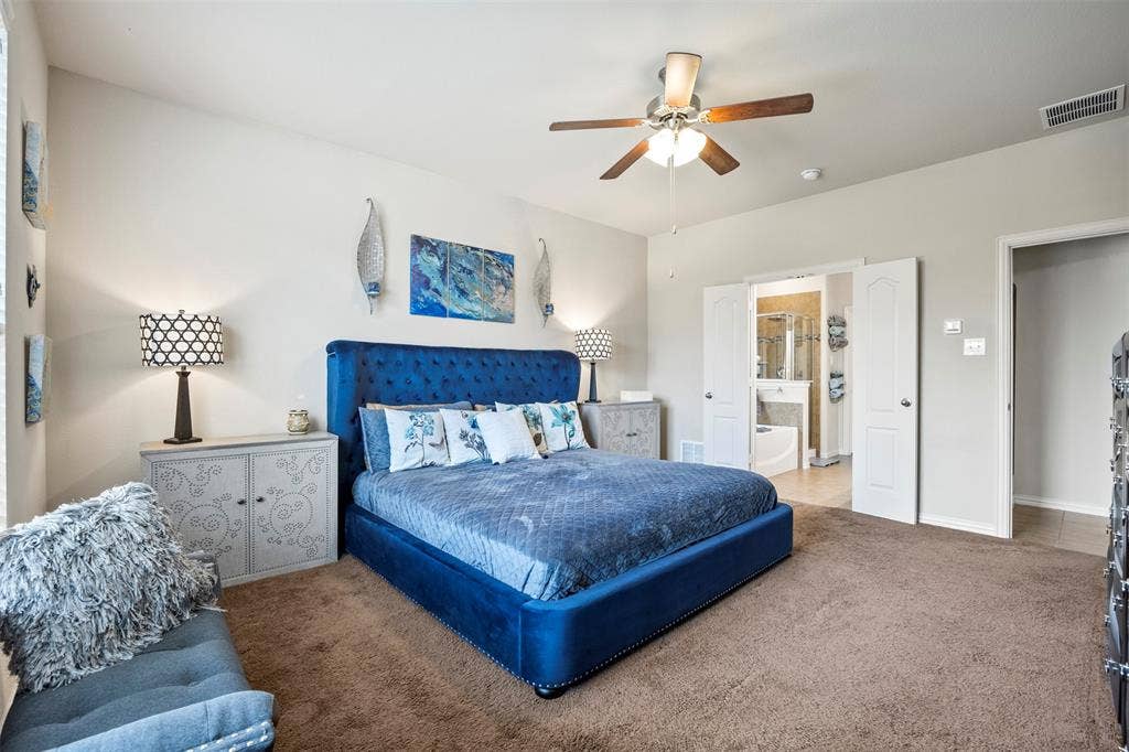 1437 Tanglewood Trail, Northlake, TX 76226 Spacious interior with carpet flooring and vaulted ceilings