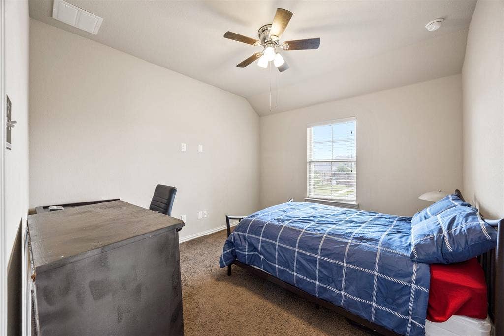 1437 Tanglewood Trail, Northlake, TX 76226 Carpeted room featuring a single window with horizontal blinds, a ceiling fan with light fixture, and neutral painted walls