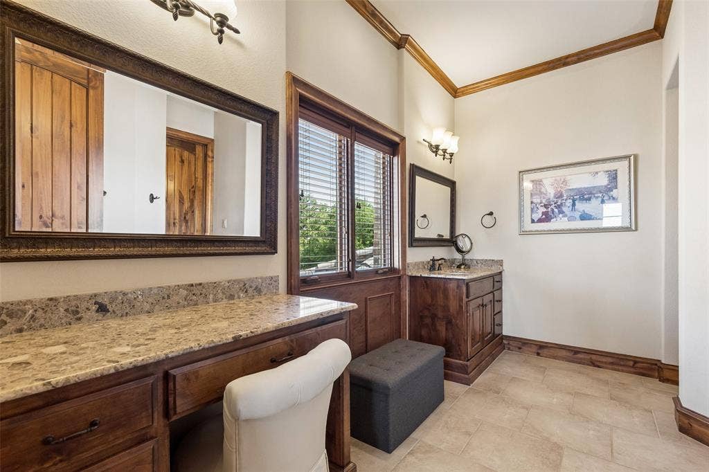 125 Audrey Drive, Keller, TX 76248 Bathroom 4 - ensuite to bedroom 4 featuring a single sink, walk in shower, vanity area, travertine flooring and a walk in closet.