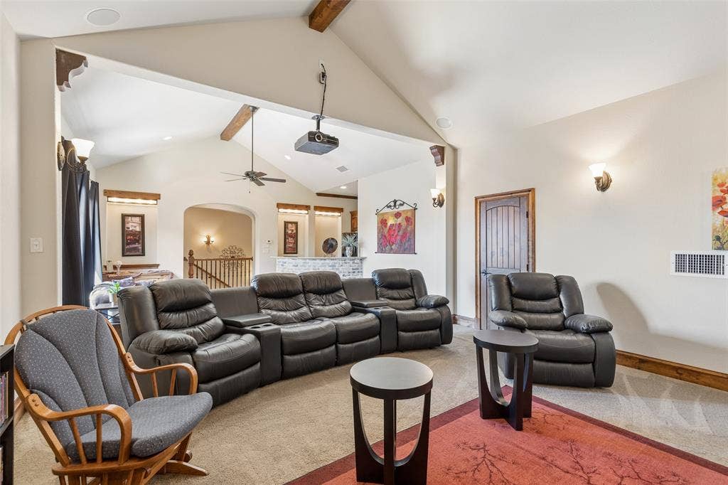 125 Audrey Drive, Keller, TX 76248 Very large flex room upstairs featuring a ceiling fan, space for media equipment and a small kitchen. Can be used for a game room or media room. Small kitchen features a full size refrigerator, a sink and plenty of cabinet space.